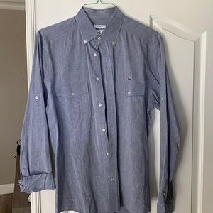 Lacoste size 40.  My husband wears medium typically.